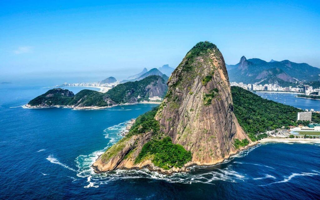 Cable car ride to the top is straight magic—360 views of Guanabara Bay, Copacabana, and Christ in the distance. Sunset here's unreal, with the city lighting up below. Spot monkeys in the trees on the way up. If you're feeling adventurous, hike partway from Urca.