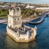 Head to Belém for these UNESCO gems. The Tower (~€6 entry) is a Manueline masterpiece on the river, symbolizing Portugal’s Age of Discoveries. Nearby, the Monastery (~€10) has intricate stonework that’ll blow you away. Walk the riverside path – it’s peaceful and leads to more spots.