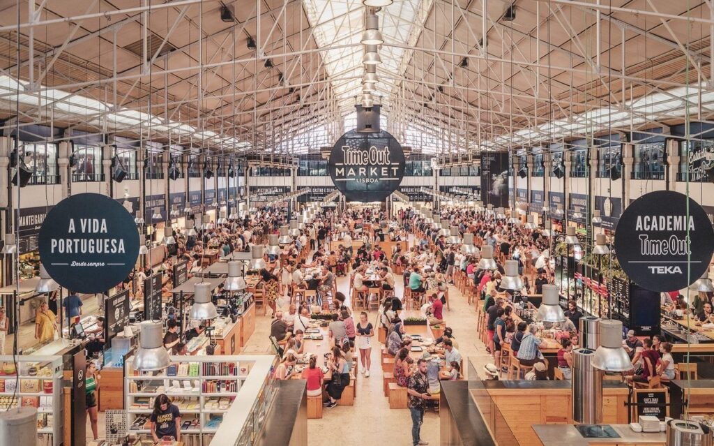 A food hall in a historic market – try petiscos (tapas) like grilled sardines or ceviche (~€10-15/meal). It’s buzzing, with stalls from top chefs. Grab a seat and people-watch.