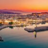 Planning a trip to Greece's largest island? See Crete's top 10 attractions: the Palace of Knossos, Samaria Gorge hike, pink-sand Elafonisi Beach, and the beautiful Venetian harbors of Chania & Rethymnon.