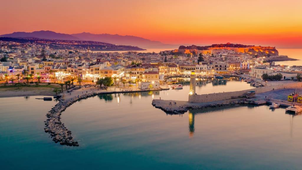 Planning a trip to Greece's largest island? See Crete's top 10 attractions: the Palace of Knossos, Samaria Gorge hike, pink-sand Elafonisi Beach, and the beautiful Venetian harbors of Chania & Rethymnon.