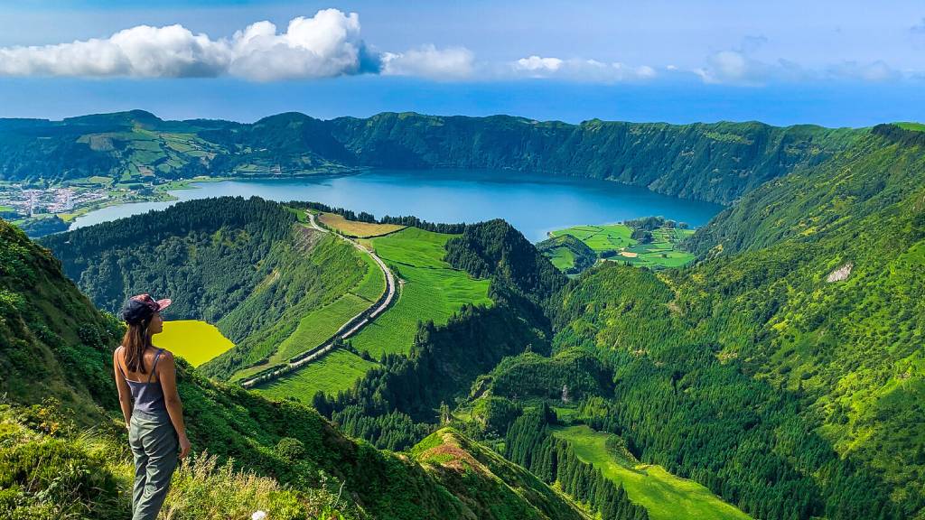 Dive into the Azores' volcanic wonders with our ultimate first-timer's guide! Explore Sete Cidades crater lakes, whale watch off Ponta Delgada, soak in Furnas hot springs, hike Lagoa do Fogo, climb Mount Pico, and more across São Miguel, Pico, Faial, and Terceira. Get tips on transport, budget, and when to visit Portugal's mid-Atlantic paradise.