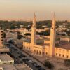 Discover the best places to visit in Nouakchott, from the chaotic Fishing Port and camel markets to grand mosques and Atlantic beaches. Get practical tips, budget advice, interactive maps, and authentic insights for your off-grid Mauritanian adventure.