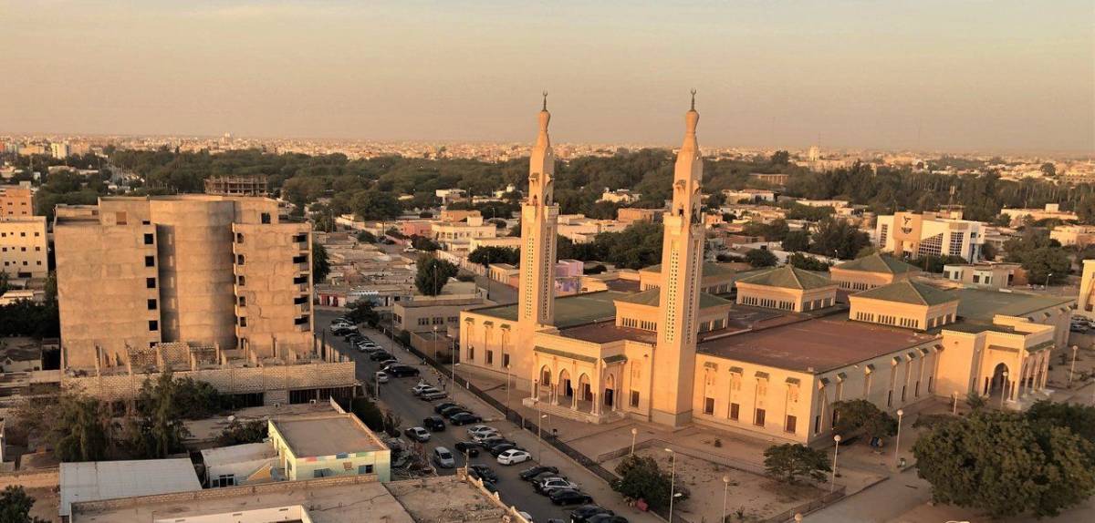 Discover the best places to visit in Nouakchott, from the chaotic Fishing Port and camel markets to grand mosques and Atlantic beaches. Get practical tips, budget advice, interactive maps, and authentic insights for your off-grid Mauritanian adventure.