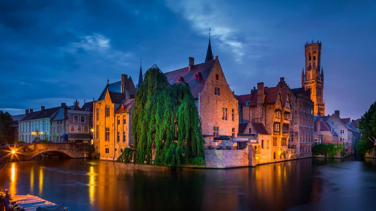 Discover the charm of Bruges on a guided day trip from Amsterdam. See UNESCO sites