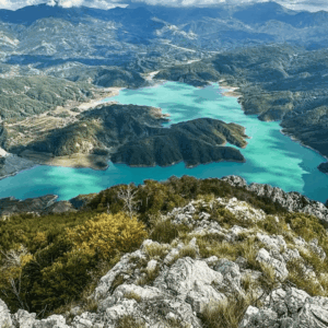 Hike to the summit of Gamti Mountain for breathtaking views of Lake Bovilla on this guided day trip from Tirana. Experience Albania. Book your tickets now!