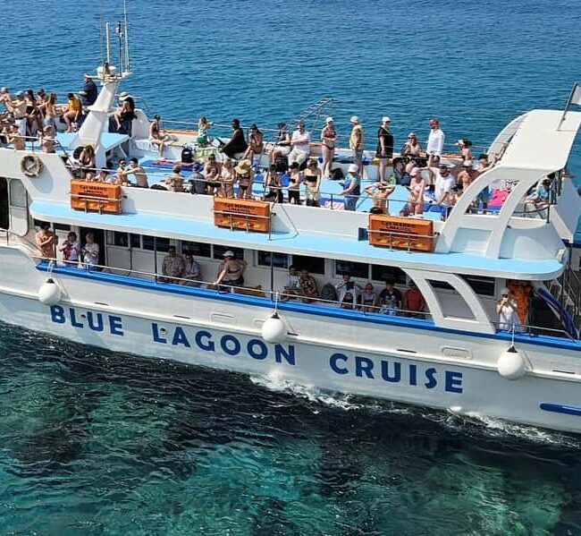 Cruise from Ayia Napa to the Blue Lagoon and Turtle Cove. Enjoy swimming stops