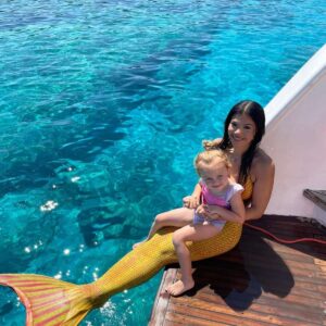 Embark on a magical 2.5-hour family cruise from Golden Coast Harbor with mermaids