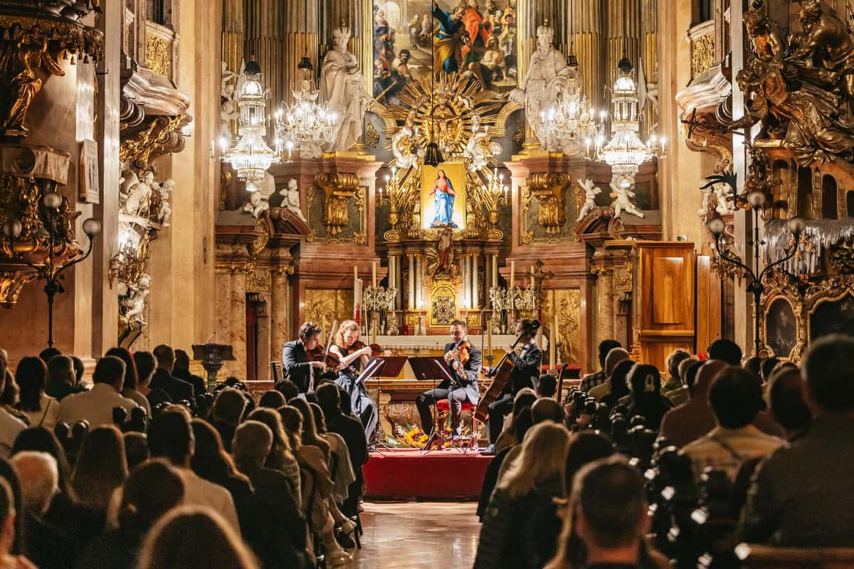 Experience an enchanting evening of classical music by Mozart and Bach in the stunning underground vaults of Vienna's St. Peter's Church. Book your tickets now!