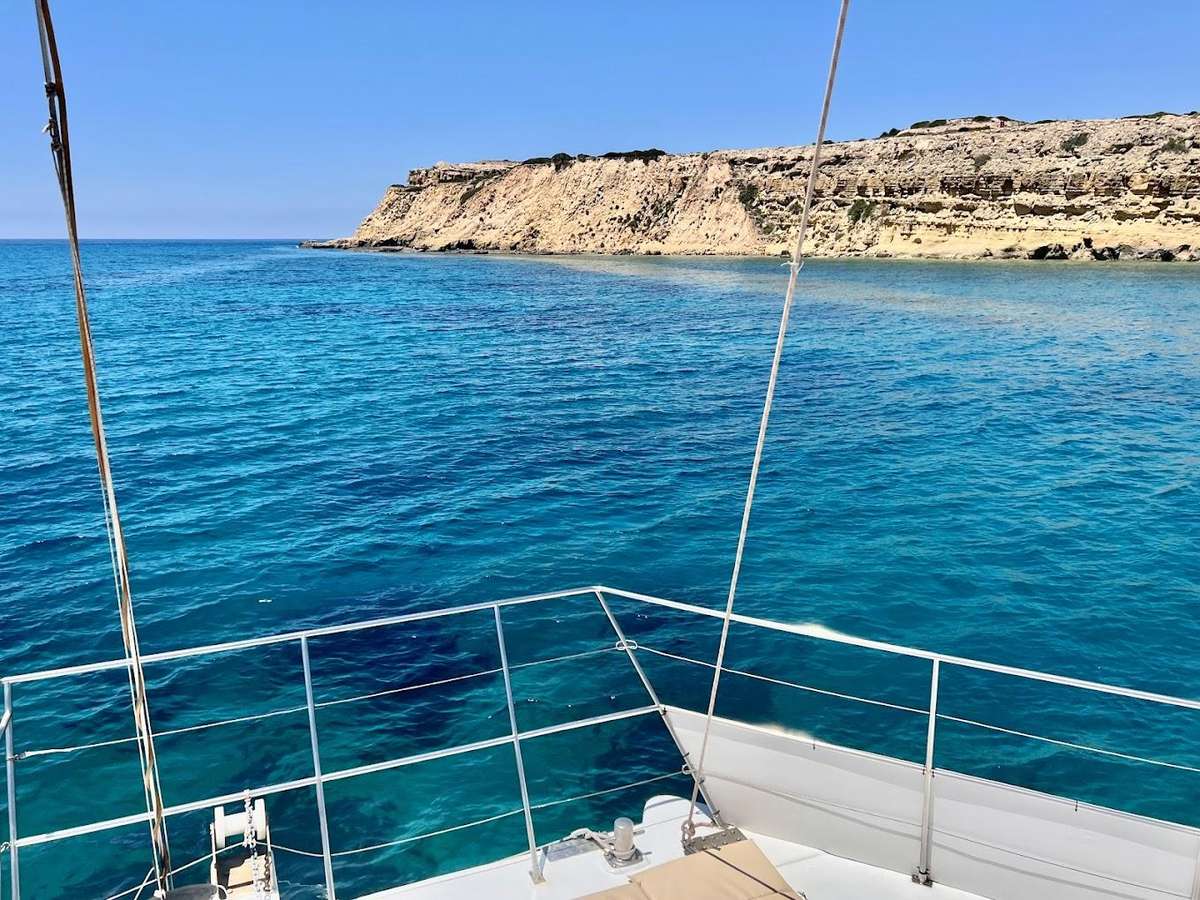 Explore Cape Gata and Ladies Mile Beach on a catamaran cruise from Limassol. Enjoy swimming